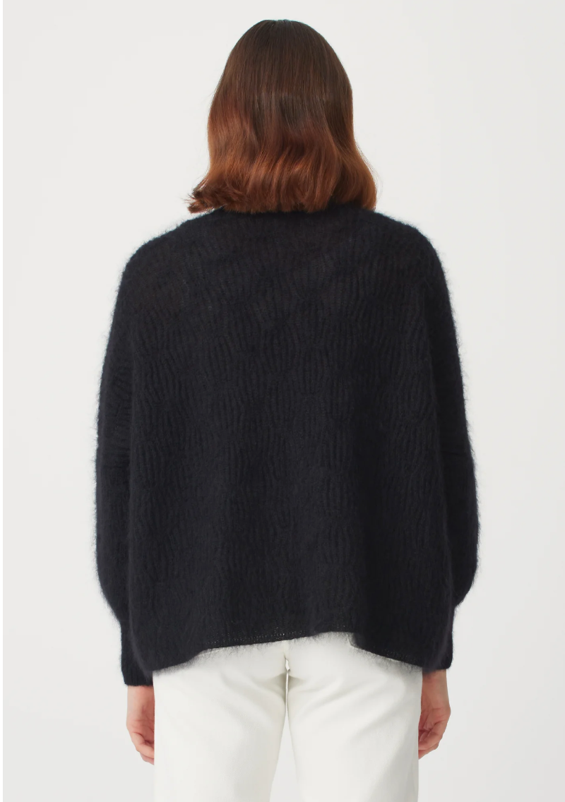 Introducing our Yama Cardi. A beautiful piece with drop shoulders and intricate knit detail made in our must-have mohair-silk blend. Wear it loose or cross it over to completely change up your look.
Made from 70% Mohair, 30% Silk
Relaxed fit
Dropped Shoulder
Stunning knit structure
Available in S - M - L
Made in New Zealand