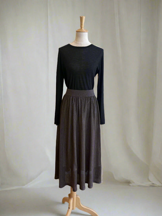 Discover timeless elegance with our cashmere skirt, featuring a full silk lining for added comfort and sophistication. Made from 100% pure cashmere, this women’s skirt offers a fluid drape, elastic waistband, and a lightweight yet warm feel, perfect for winter layering or elevated evening wear.