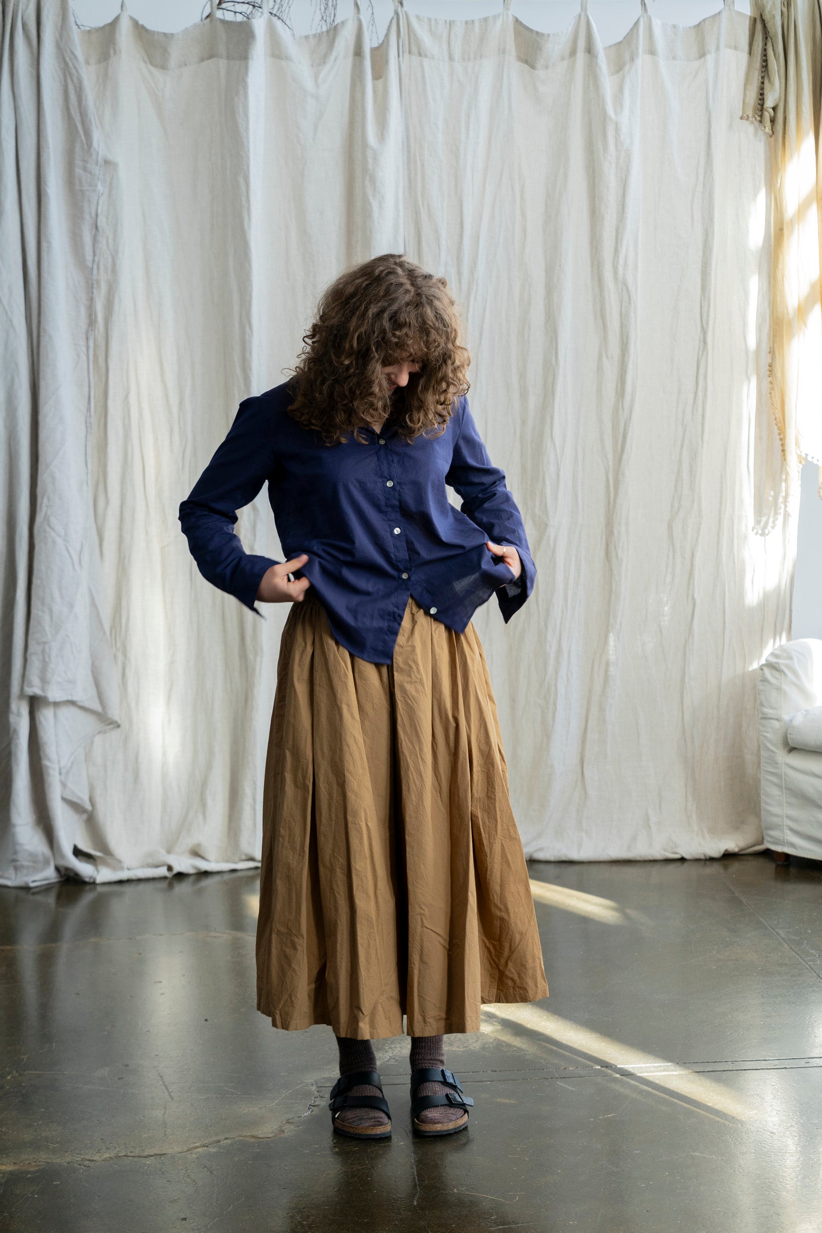 Nestled in the heart of Toorak Road, Melbourne, our boutique offers a thoughtfully curated collection of organic cotton clothing designed for the modern woman who values comfort, quality, and conscious living. Each piece in our collection is made from 100% organic cotton, combining timeless design with sustainable practices to bring you garments that feel as good as they look.

From effortlessly flowy cotton dresses and lightweight jackets to relaxed-fit pants and delicate broderie anglaise pieces, our rang