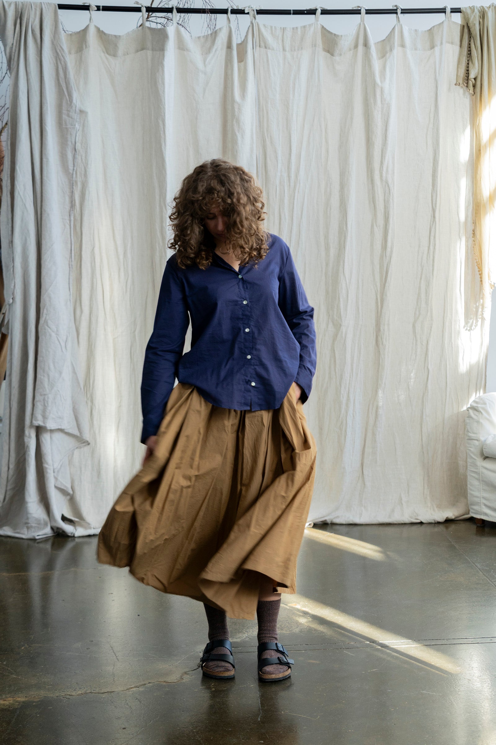 Nestled in the heart of Toorak Road, Melbourne, our boutique offers a thoughtfully curated collection of organic cotton clothing designed for the modern woman who values comfort, quality, and conscious living. Each piece in our collection is made from 100% organic cotton, combining timeless design with sustainable practices to bring you garments that feel as good as they look.

From effortlessly flowy cotton dresses and lightweight jackets to relaxed-fit pants and delicate broderie anglaise pieces, our rang