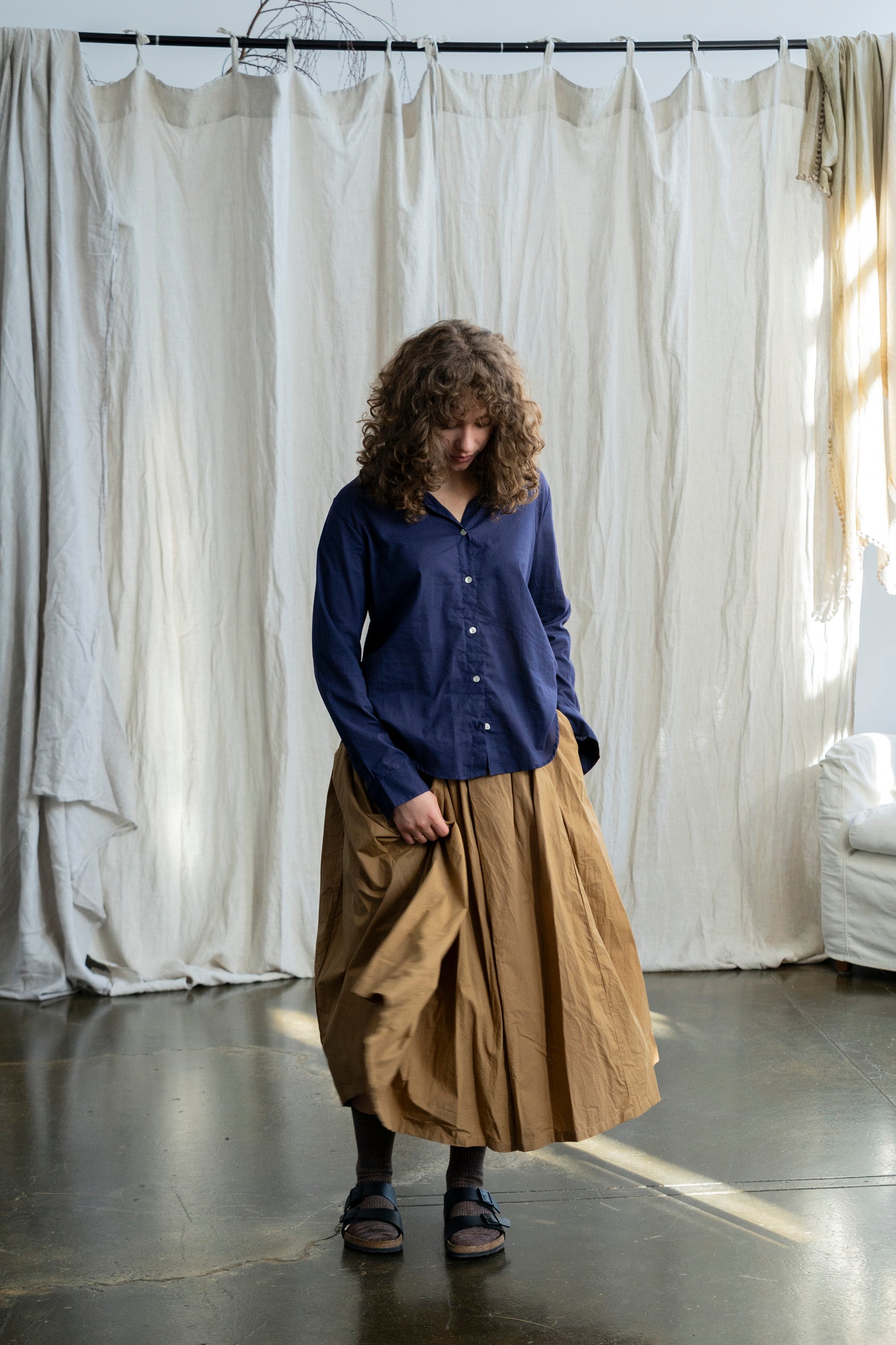 Nestled in the heart of Toorak Road, Melbourne, our boutique offers a thoughtfully curated collection of organic cotton clothing designed for the modern woman who values comfort, quality, and conscious living. Each piece in our collection is made from 100% organic cotton, combining timeless design with sustainable practices to bring you garments that feel as good as they look.

From effortlessly flowy cotton dresses and lightweight jackets to relaxed-fit pants and delicate broderie anglaise pieces, our rang
