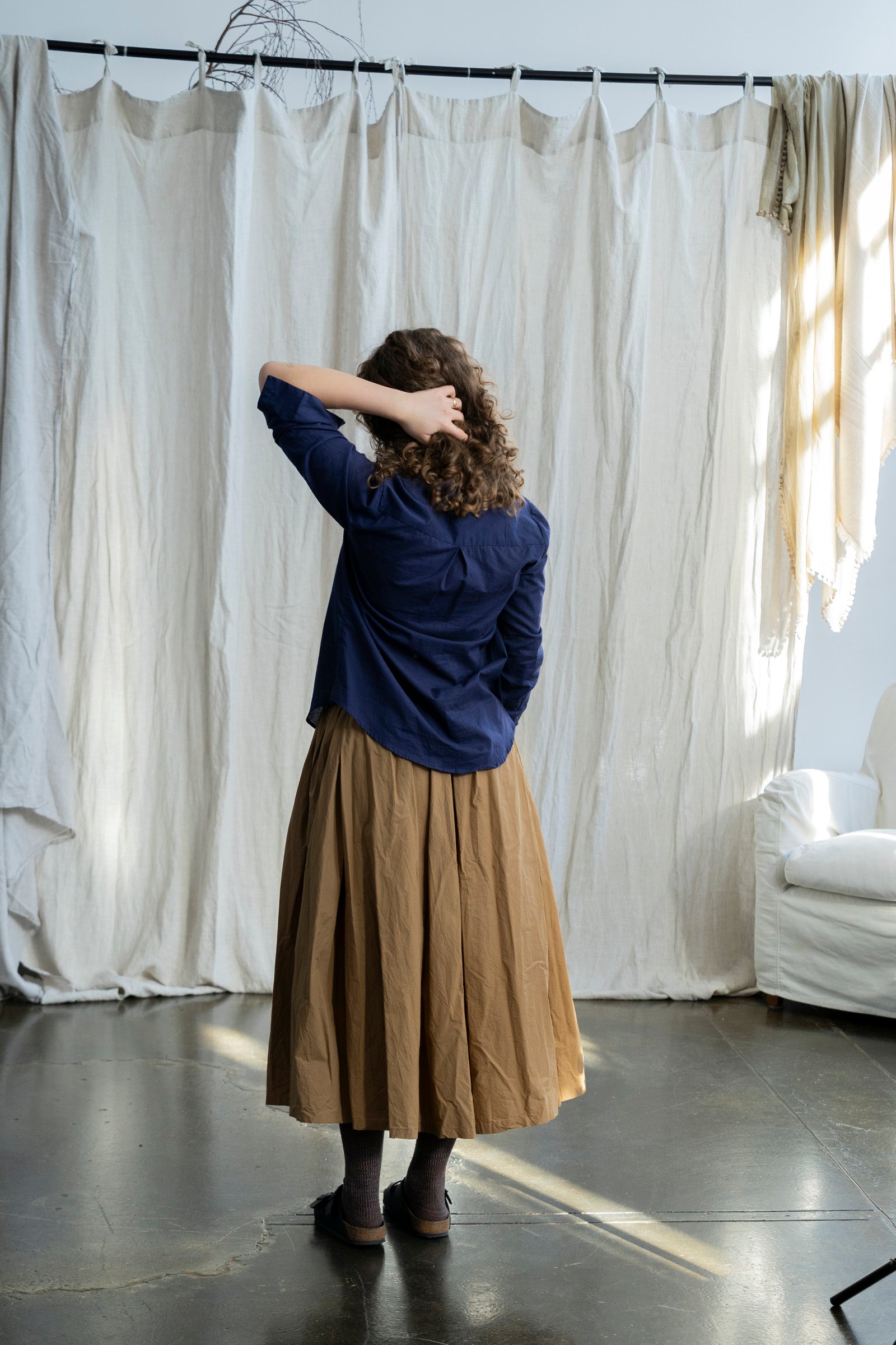 Nestled in the heart of Toorak Road, Melbourne, our boutique offers a thoughtfully curated collection of organic cotton clothing designed for the modern woman who values comfort, quality, and conscious living. Each piece in our collection is made from 100% organic cotton, combining timeless design with sustainable practices to bring you garments that feel as good as they look.

From effortlessly flowy cotton dresses and lightweight jackets to relaxed-fit pants and delicate broderie anglaise pieces, our rang