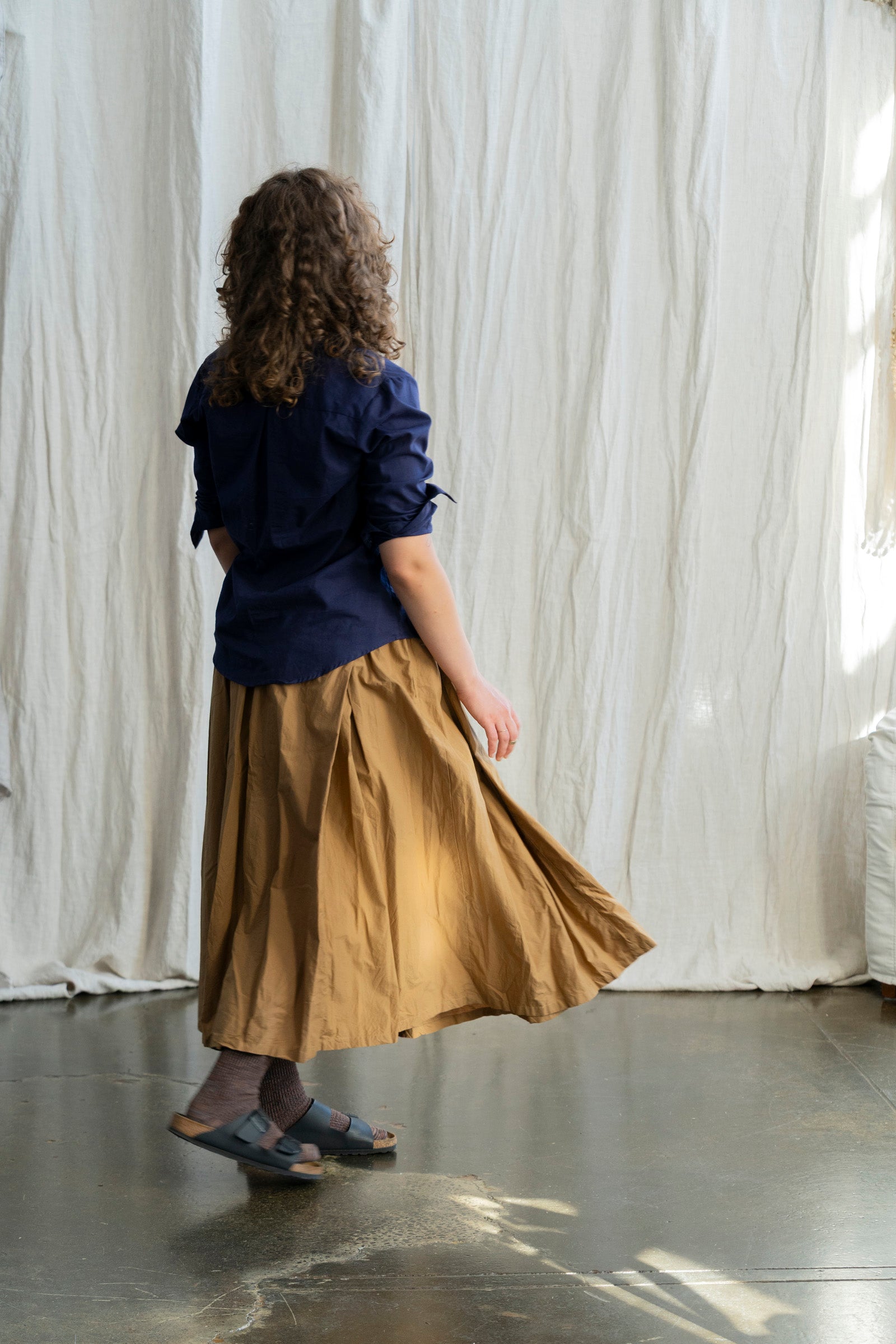 Nestled in the heart of Toorak Road, Melbourne, our boutique offers a thoughtfully curated collection of organic cotton clothing designed for the modern woman who values comfort, quality, and conscious living. Each piece in our collection is made from 100% organic cotton, combining timeless design with sustainable practices to bring you garments that feel as good as they look.

From effortlessly flowy cotton dresses and lightweight jackets to relaxed-fit pants and delicate broderie anglaise pieces, our rang